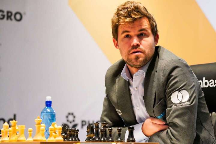 Magnus Carlsen resigns from match after one move as chess storm intensifies