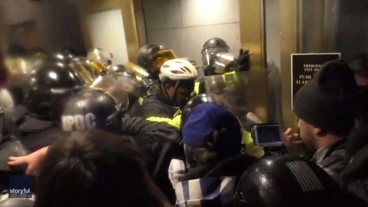 Police recall getting attacked with their own riot shields on Jan. 6