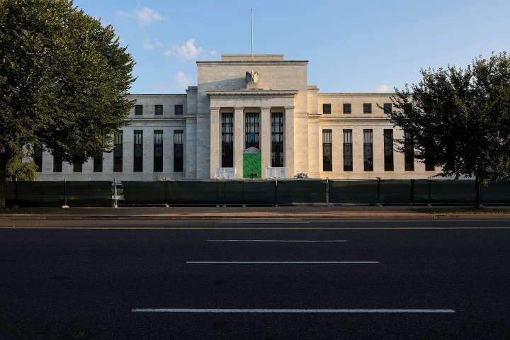Why does the Fed raise interest rates?