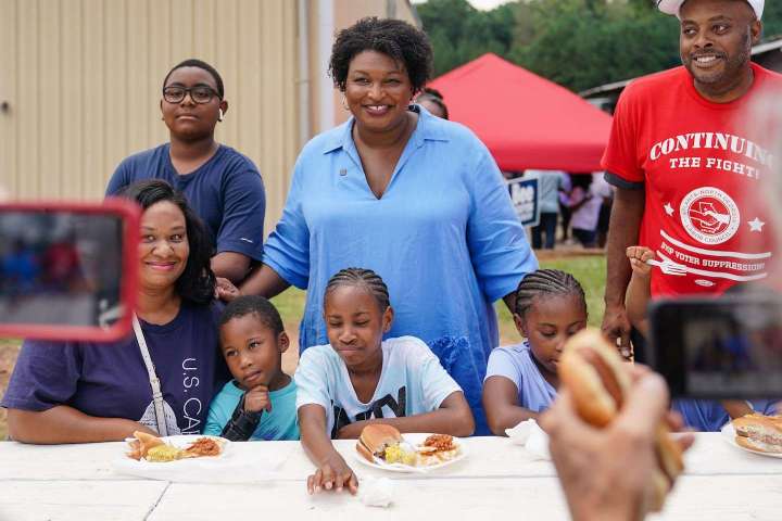 Federal judge upholds Georgia election law in challenge brought by Abrams