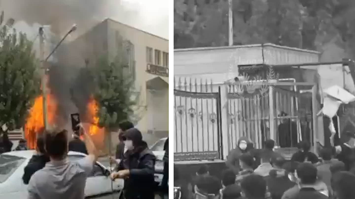 Iranian forces open fire on protesters as government buildings burn