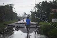 Lisa slams Belize as Martin becomes farthest-north November hurricane