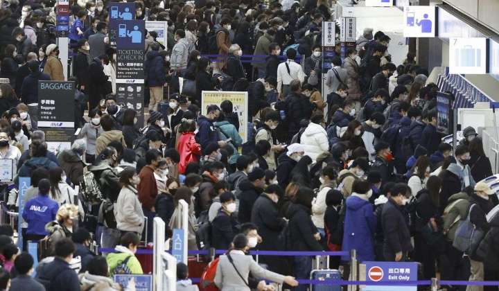 Japan tests all China arrivals for COVID as cases surge