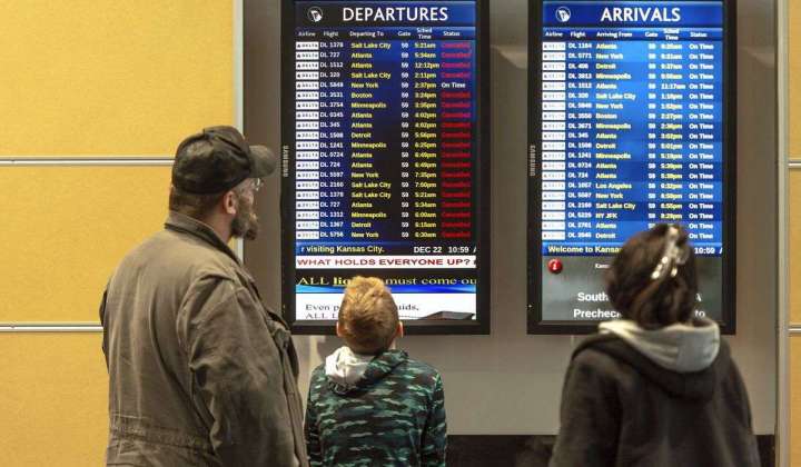 Over 5,700 flight delays and over 2,000 cancellations as winter storms blast America