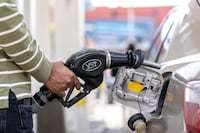 U.S. gas prices plunge toward $3 a gallon as demand drops worldwide