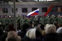 Using conscripts and prison inmates, Russia doubles its forces in Ukraine