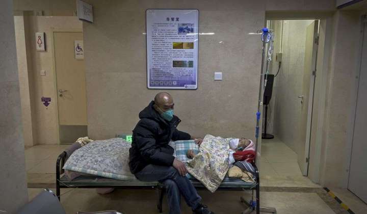 Beds run out at Beijing hospital as COVID-19 spreads