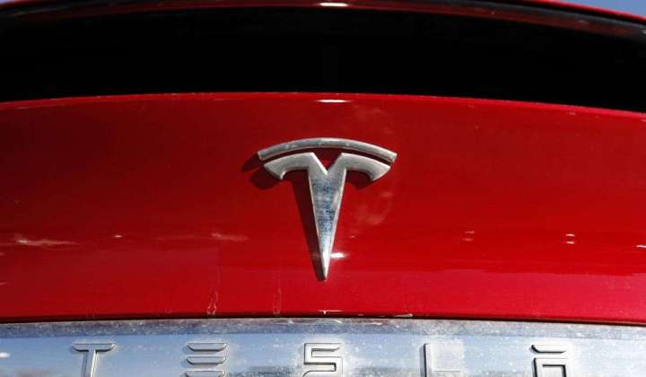 Self-driving Tesla causes pileup as questions about technology mount