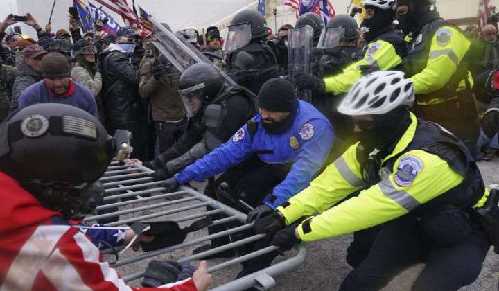 FBI says newspaper editor interfered with police at Capitol riot
