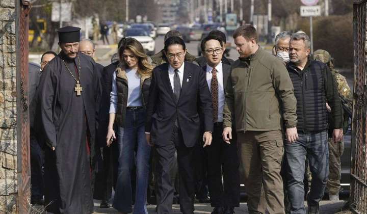 Japan’s Kishida makes surprise Kyiv trip while China’s Xi visits Moscow
