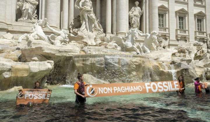 Climate activists dump coal in Rome’s Trevi Fountain to protest fossil fuels