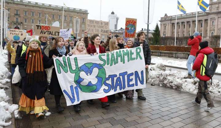 Climate activists rammed by camera while intruding on Swedish dance show