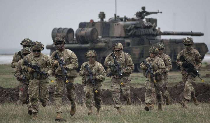 NATO readies military plans to defend against bruised but unbowed Russia