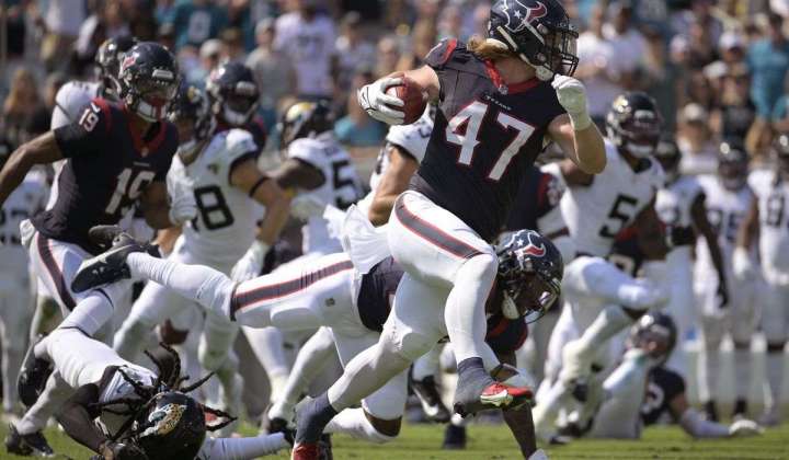 Beck’s rare TD return propels Texans to rout of Jaguars and gives Ryans his first win