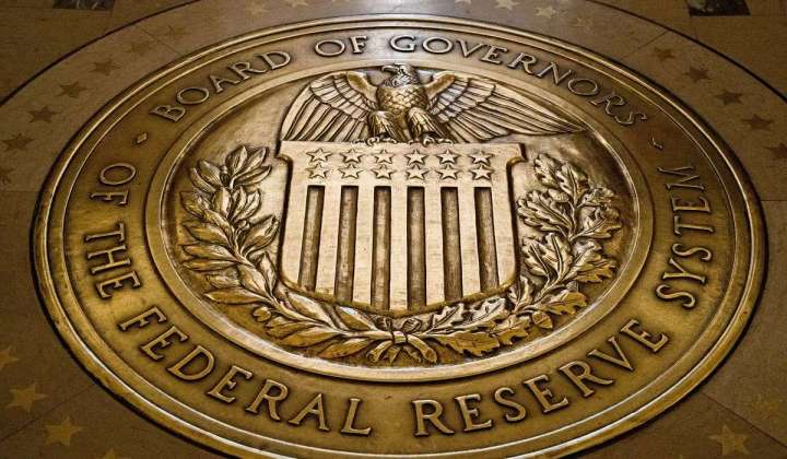 Fed keeps rates unchanged but signals likelihood of another hike this year to fight inflation