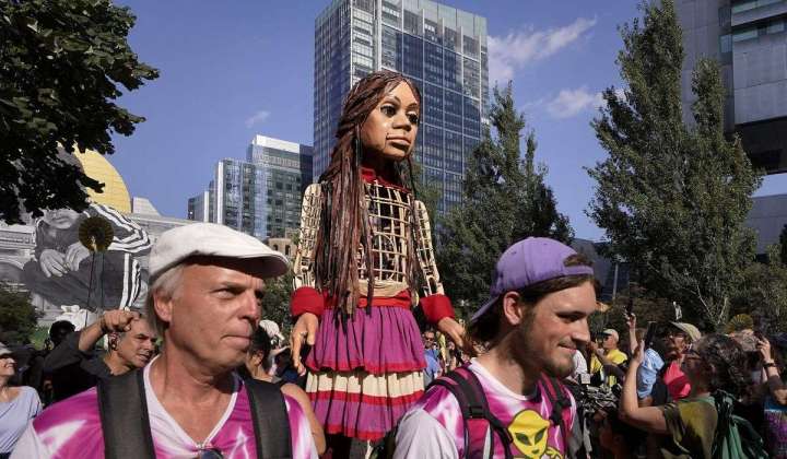 Little Amal, a 12-foot puppet of a Syrian refugee, began its journey across the U.S. in Boston
