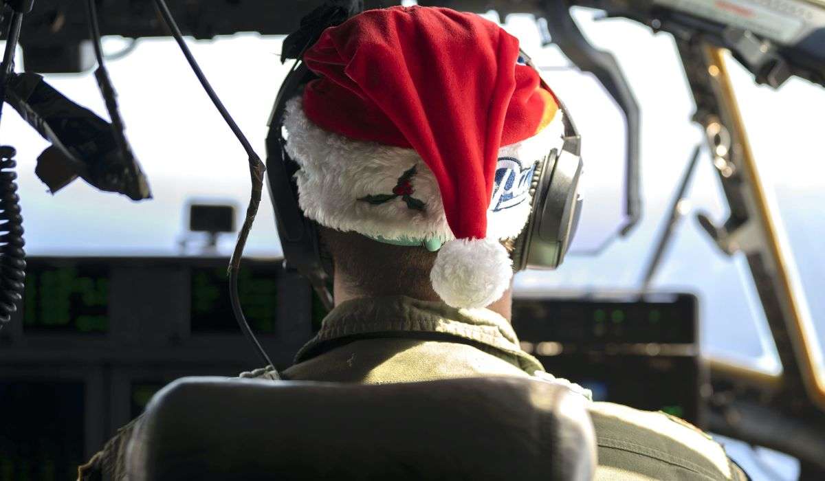 Like Santa’s reindeer, C-130 cargo planes spread Christmas joy across the Pacific
