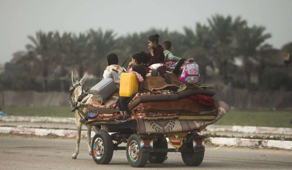 On foot and by donkey cart, thousands flee widening Israeli assault in Gaza
