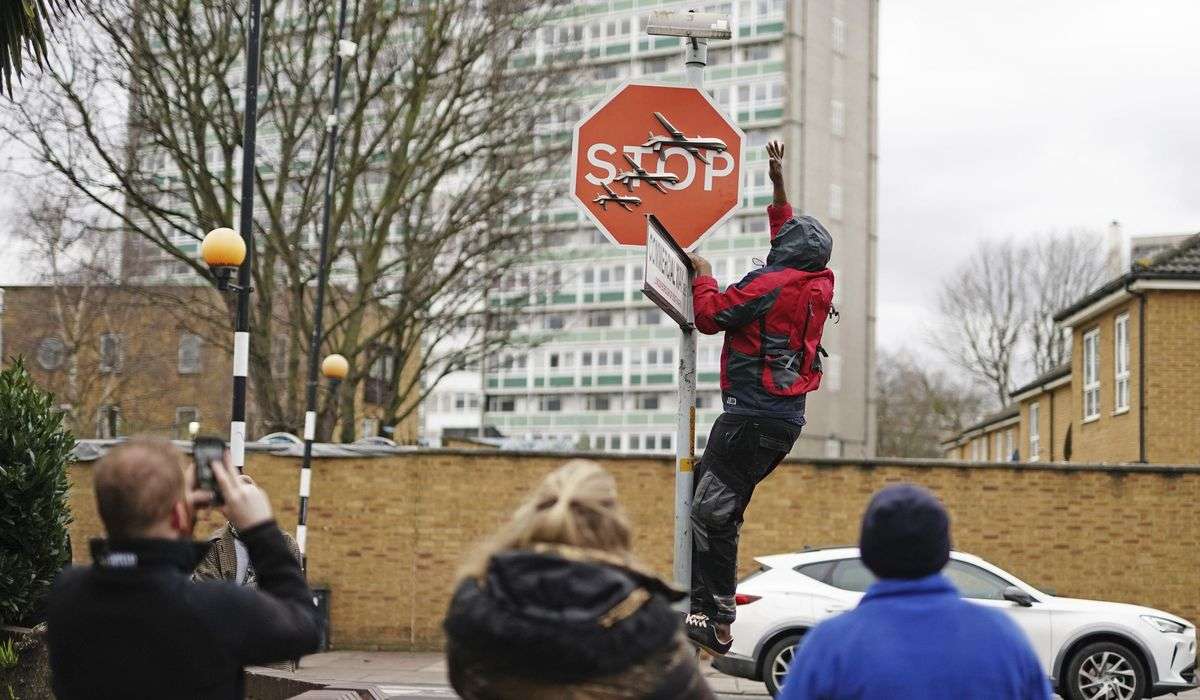 Suspect arrested in alleged theft of a Banksy stop sign decorated with military drones