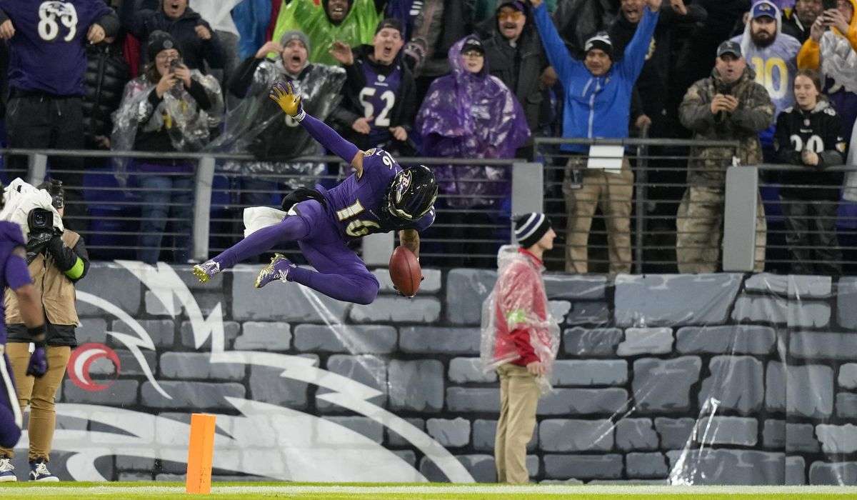 Walk-off Wallace: Ravens punt returner goes 76 yards for TD in OT in a 37-31 win over the Rams
