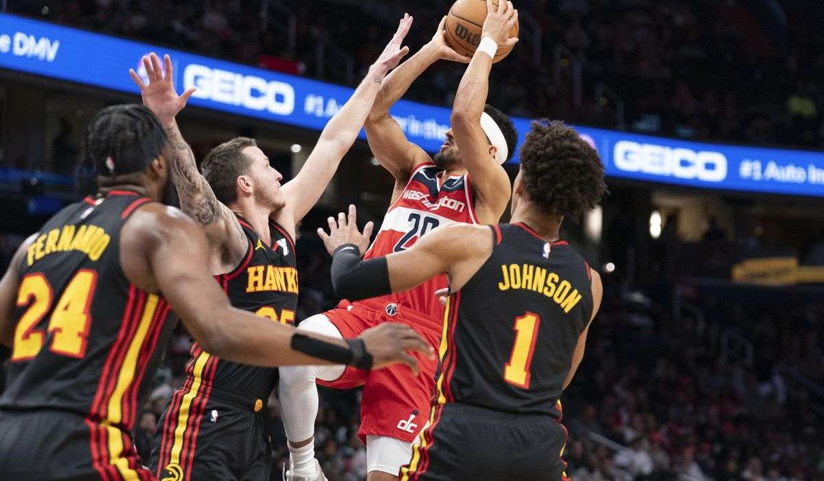 Young has 40 points and 13 assists, Hawks outlast Wizards
